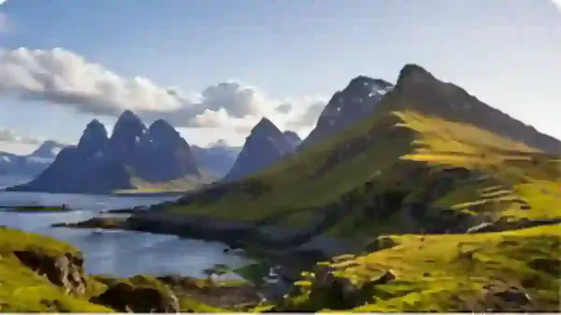 Green coastal cliffs and sea stacks on the Isle of Skye